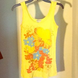 Yellow tank top with Floral print on the front